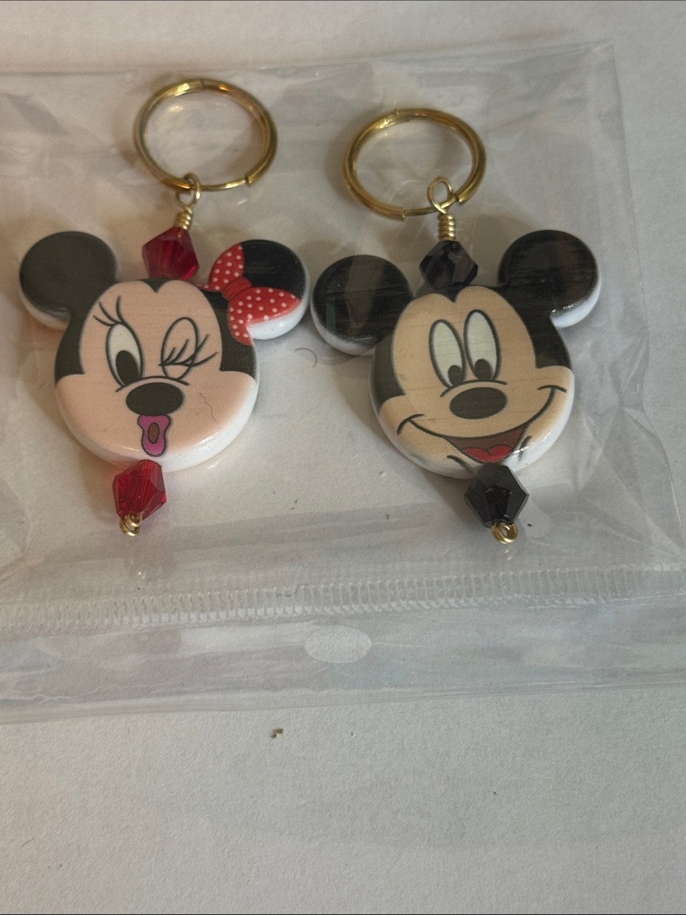Character-Inspired Gold-Tone Earrings with Black and Red Accents